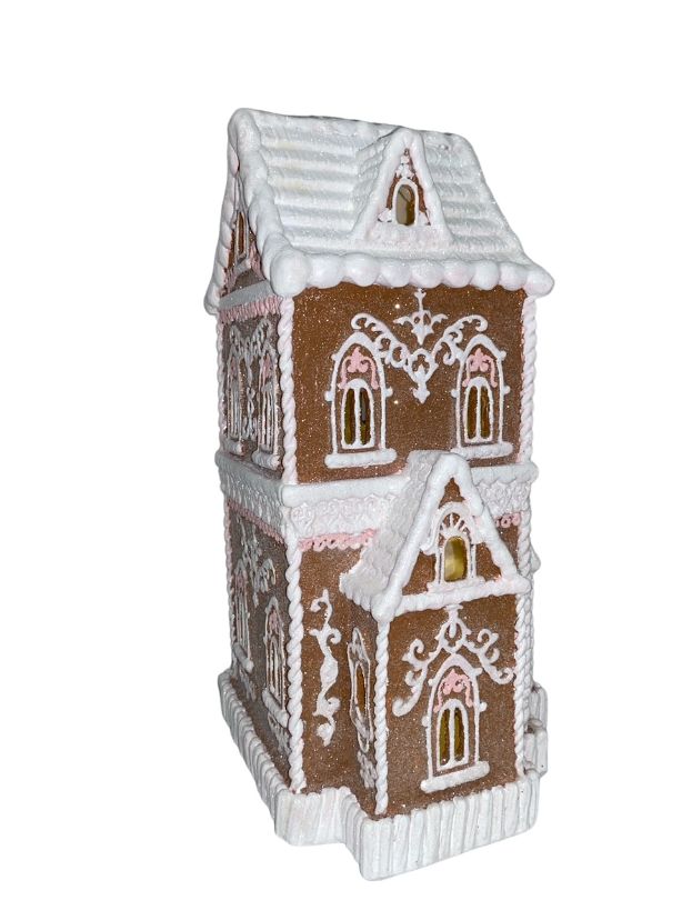 brown with pink trim Victorian gingerbread house